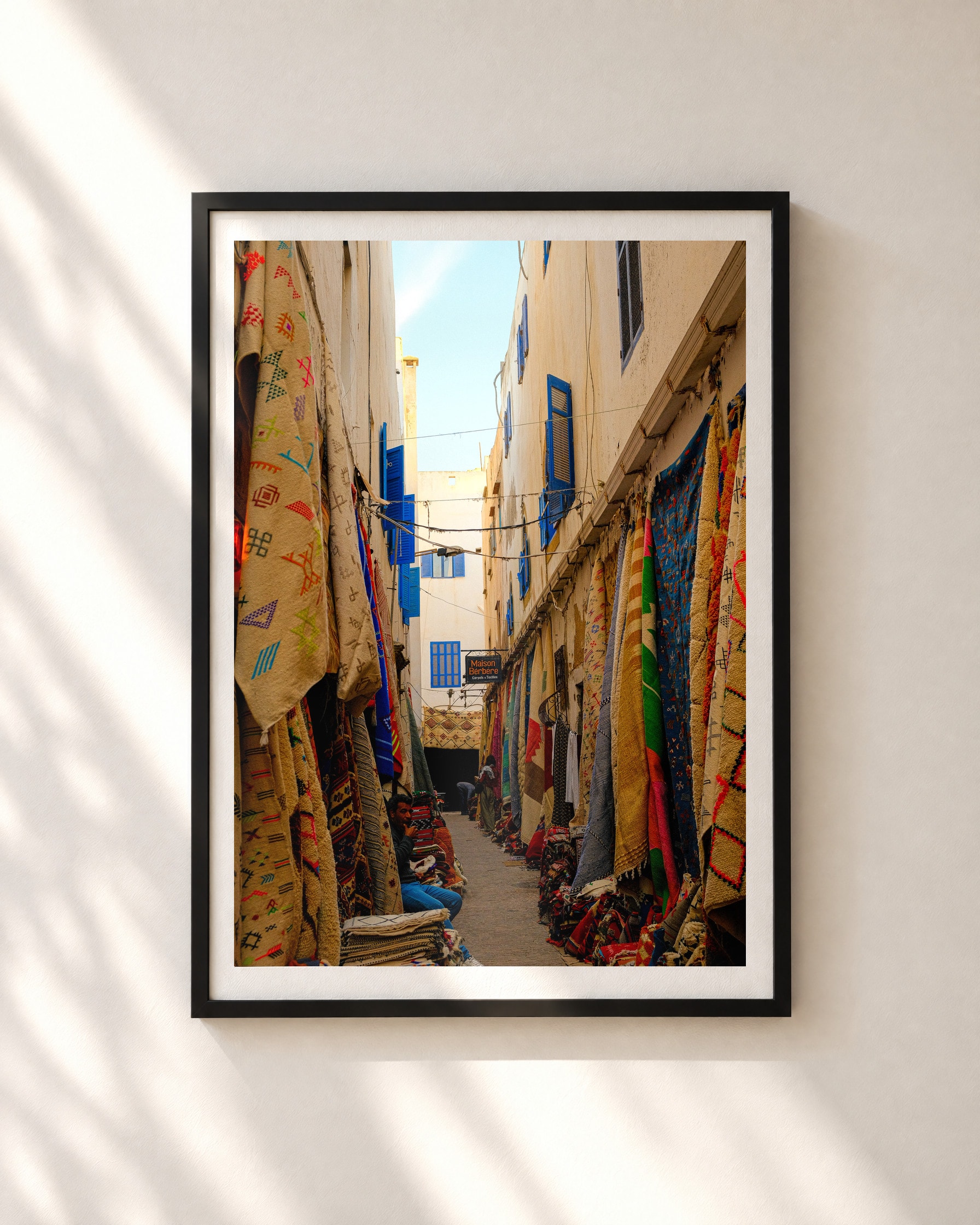 Rug Alley, Essaouira, framed print shown on a wall