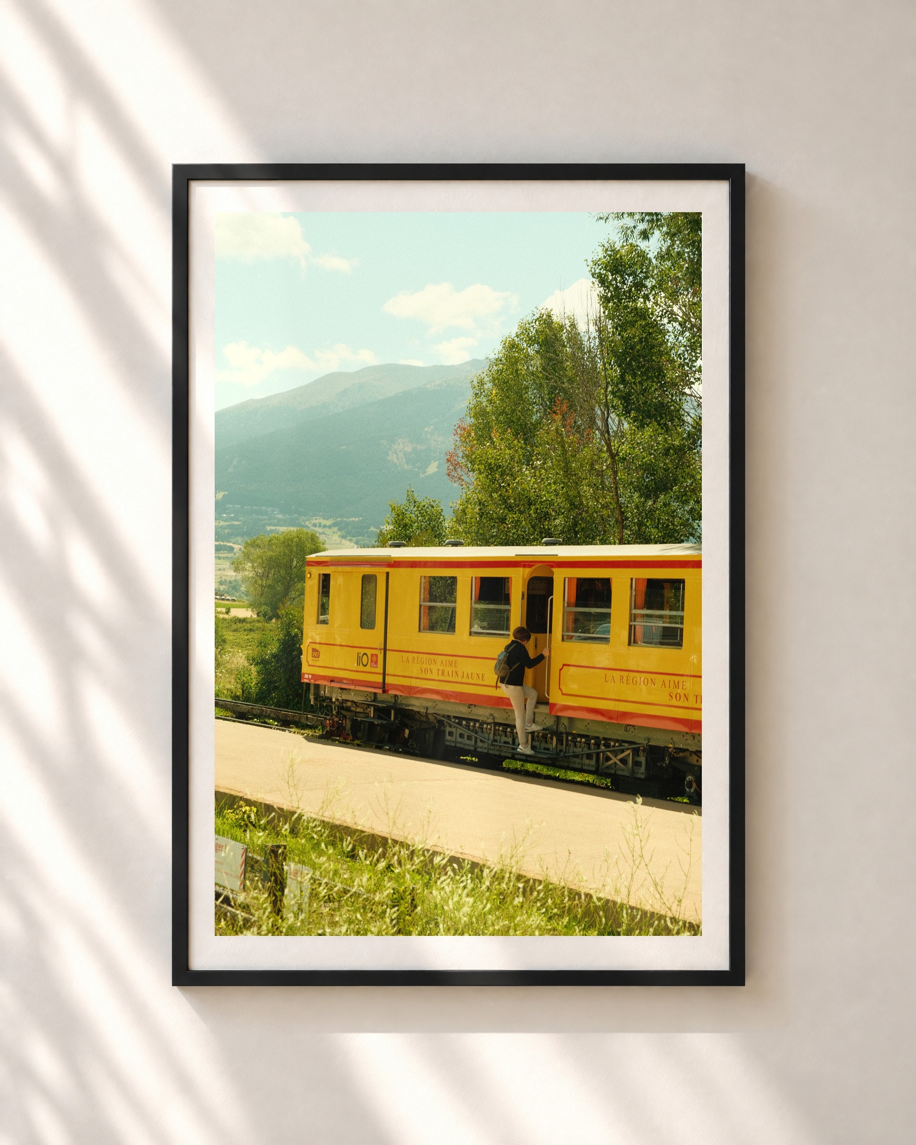 Boarding, Train Jaune, framed print shown on a wall