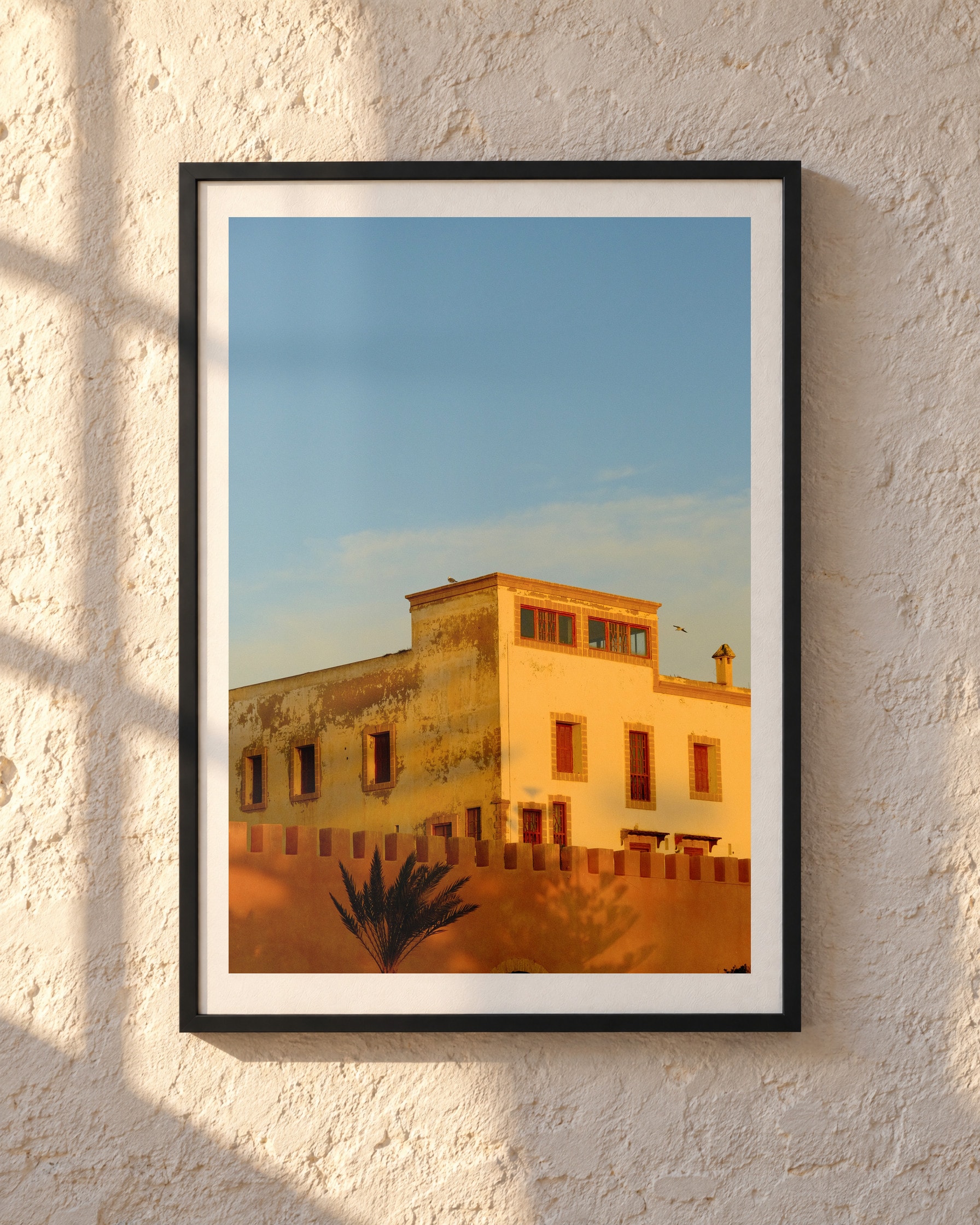 Essaouira Walls, framed print shown on a wall