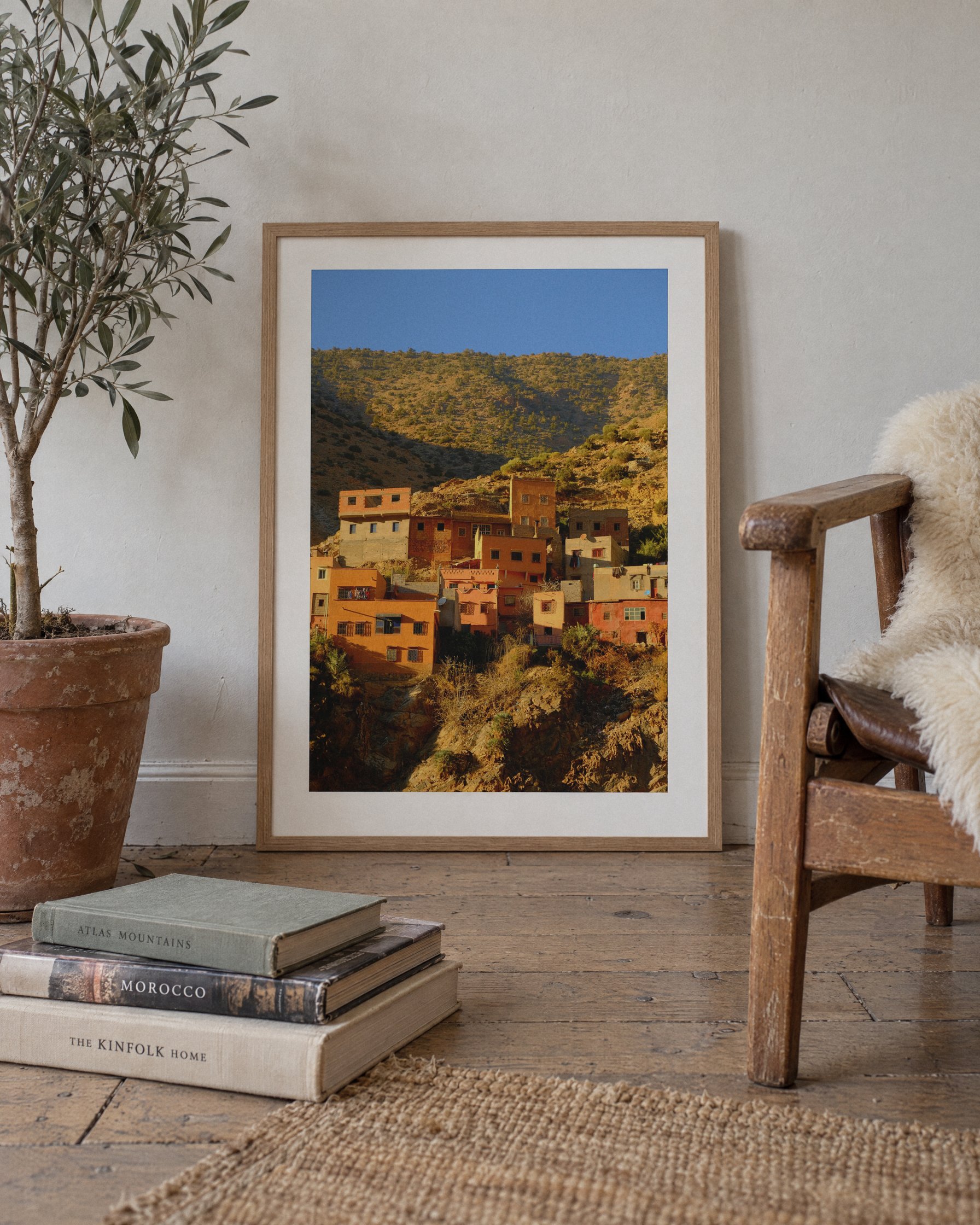Mountain Village, framed print shown on a wall