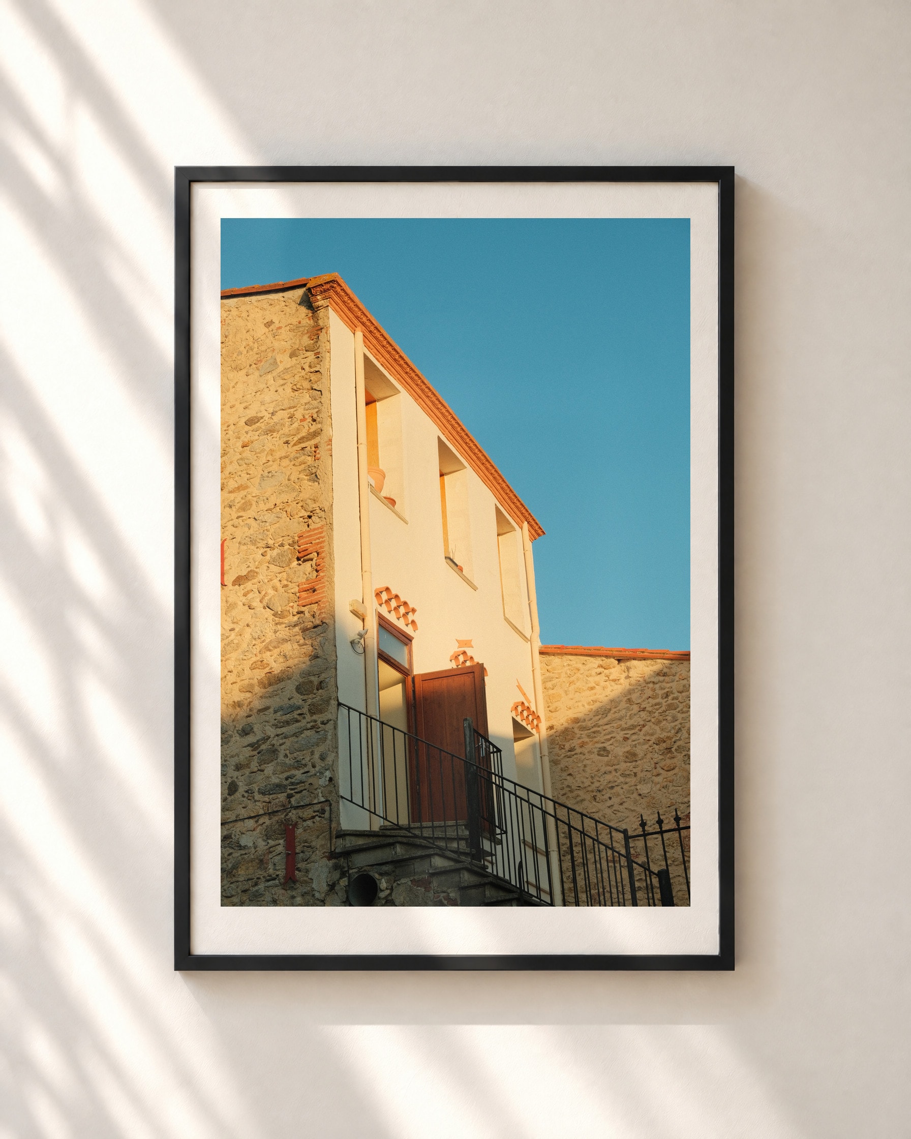 Red Door, framed print shown on a wall